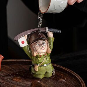 Kneeling in surrender, the tea pet changes color.